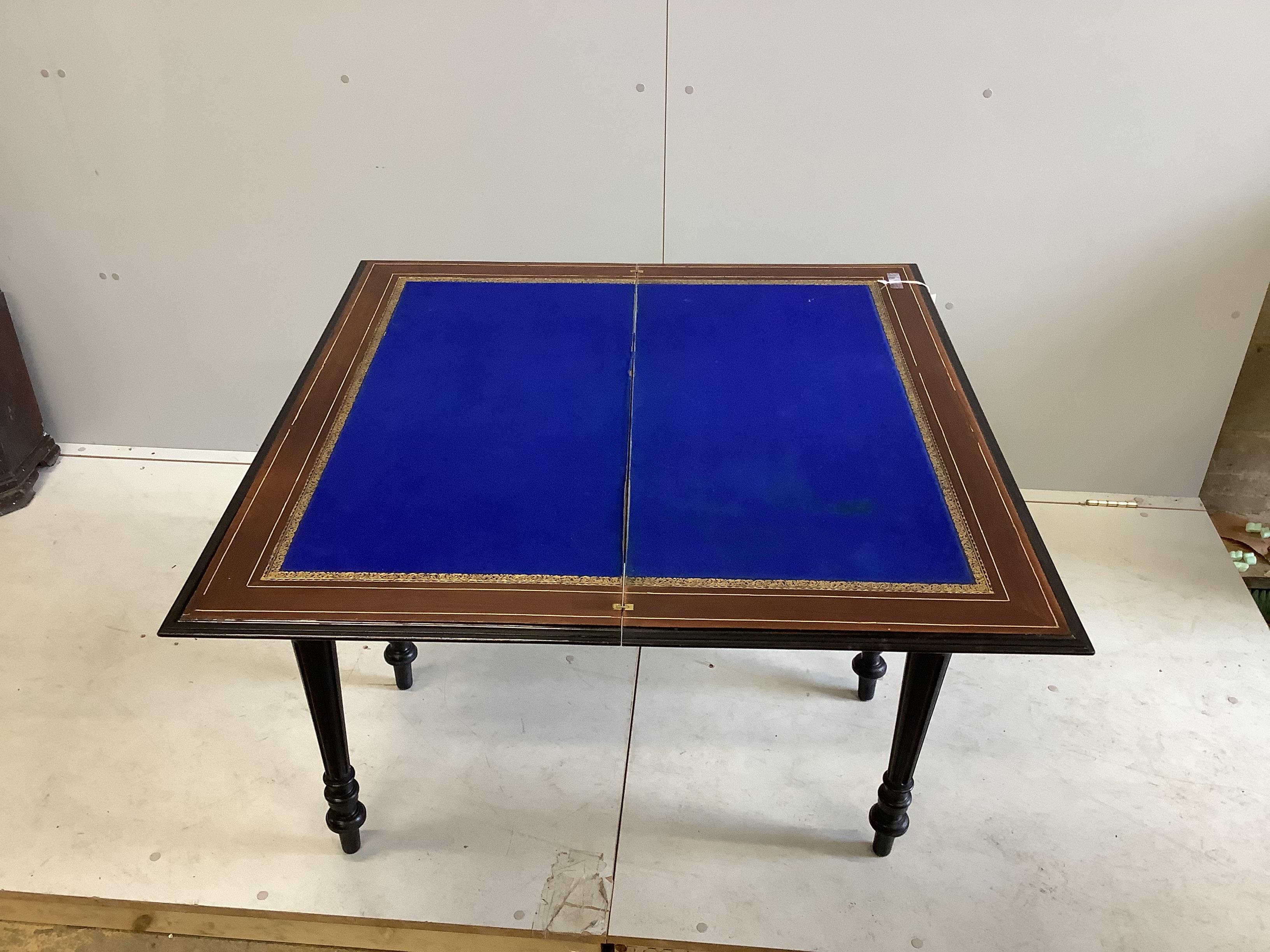 A late 19th century Italian copper, brass and bone marquetry inlaid walnut and ebonised folding card table, width 94cm, depth 46cm, height 75cm